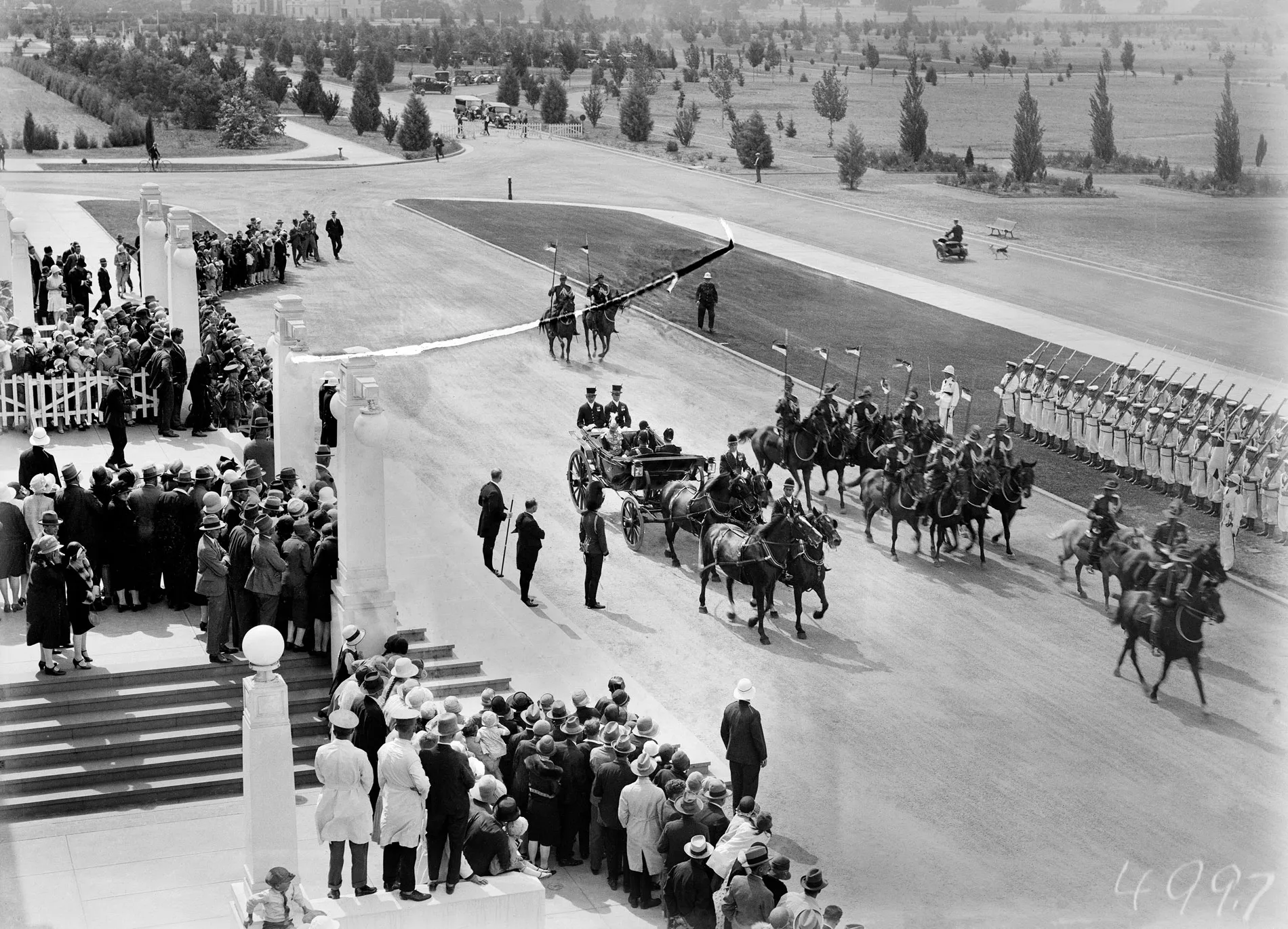 Governor-General Lord Stonehaven arrives at Parliament House in a carriage escorted by the Light Horse.