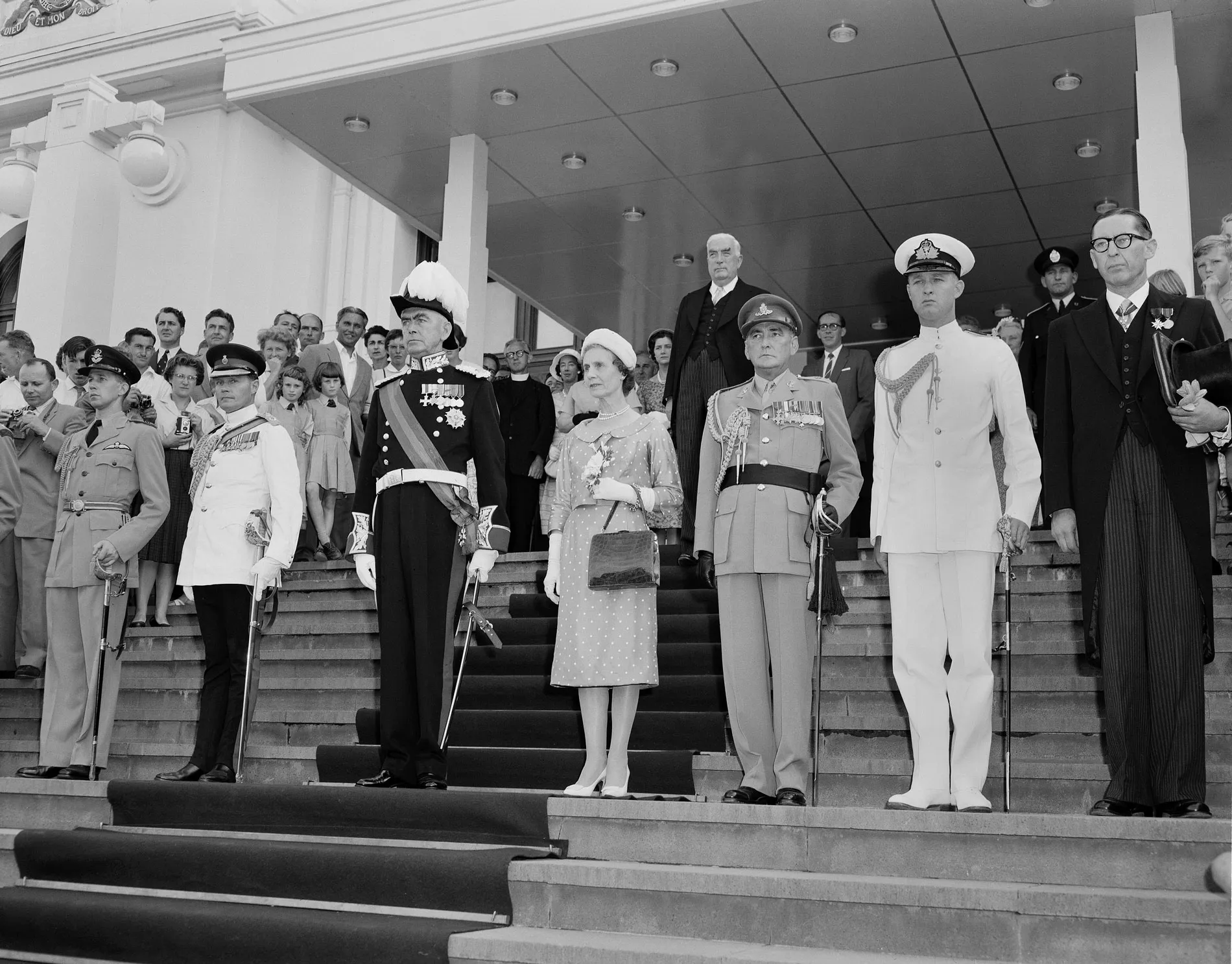 Viscount and Viscountess Dunrossil stand on the steps of Old Parliament House with other dignitaries including Sir Robert Menzies.