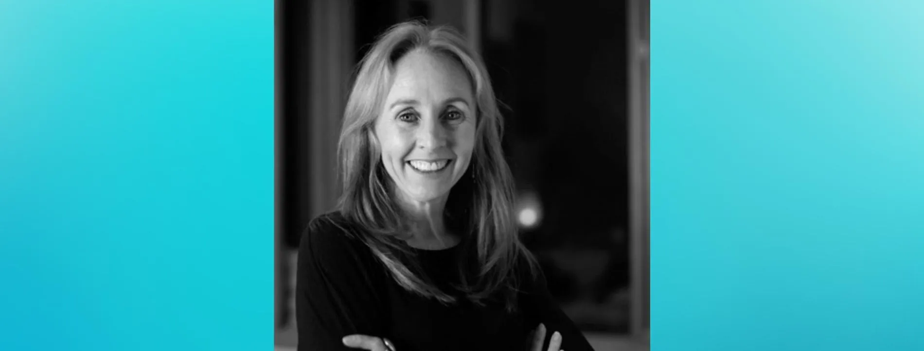 Photo of author Kath Murdoch against a teal background.