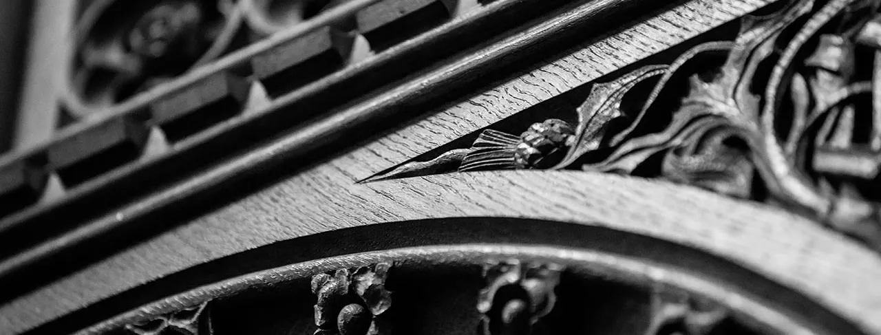 Decorative wood detailing on a panel in Old Parliament House.