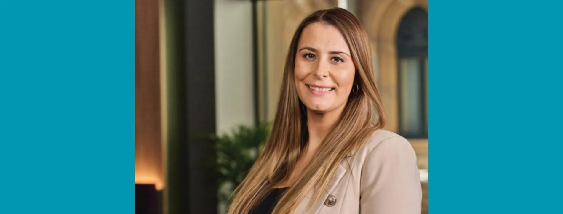 Photo of storyteller and educator Kylie Captain against a teal background.