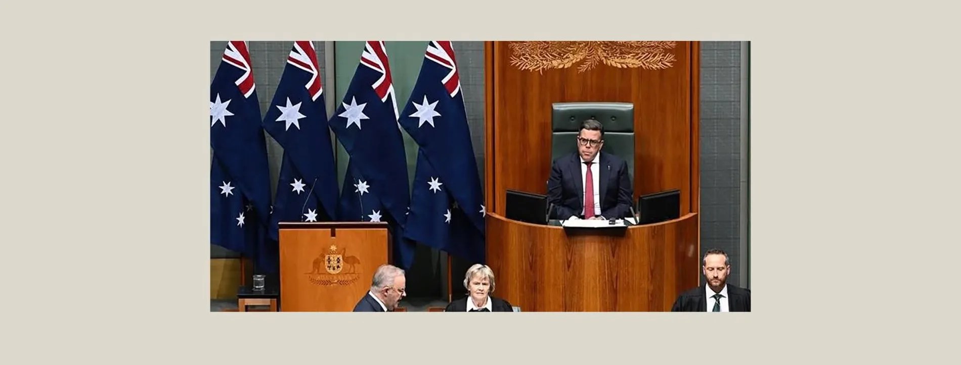 A banner with Milton Dick in the Speakers Chair while in session.