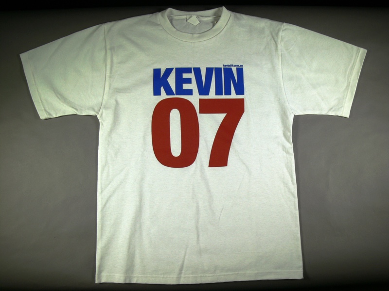 A white t-shirt with the words 'Kevin' in blue and '07' in red.