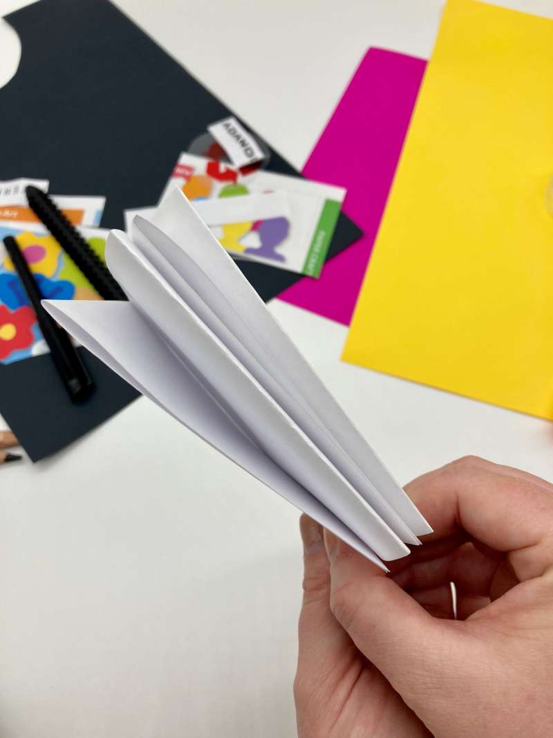 A piece of paper folded over to make a booklet with pages. 