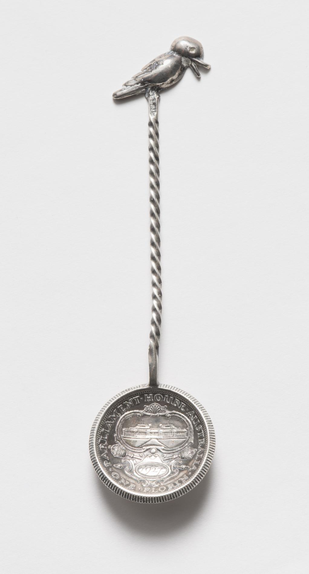 Photograph of an ornate souvenir spoon