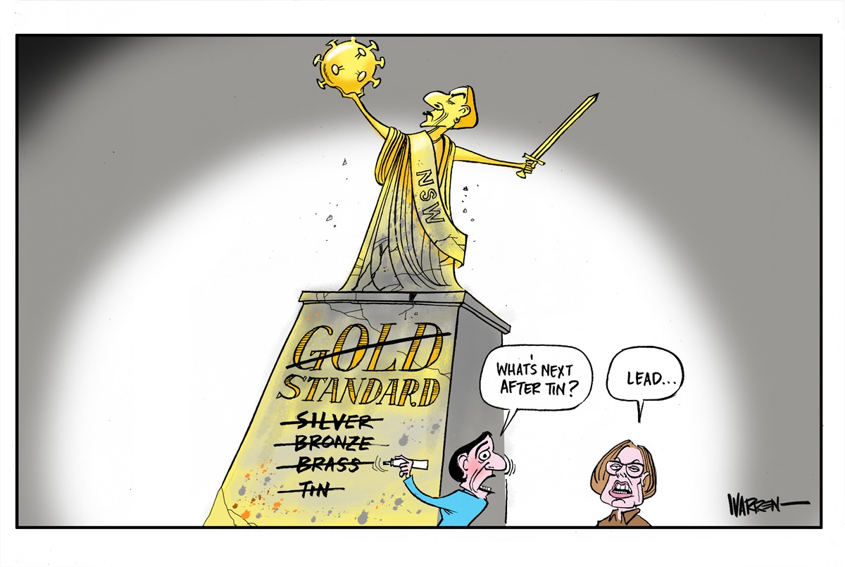 Gladys Berejiklian stands next to a gold statue of herself with a NSW sash. She has crossed off standard levels from gold down to tin on the statue. She asks Dr Kerry Chant, 'What's next after tin?' Chant replies 'Lead...' 