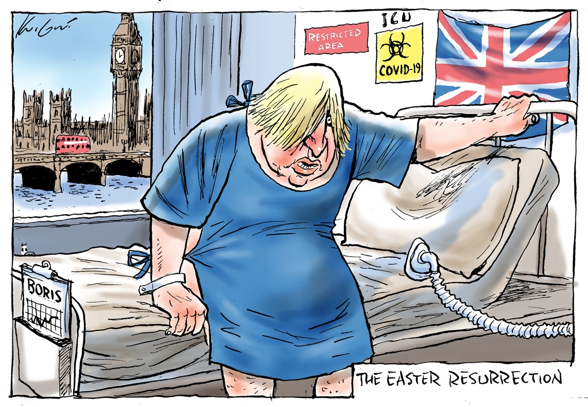 Boris Johnson in a blue hospital gown sits on a hospital bed in a room overlooking the River Thames and Palace of Westminster. He is trying to get up out of bed.