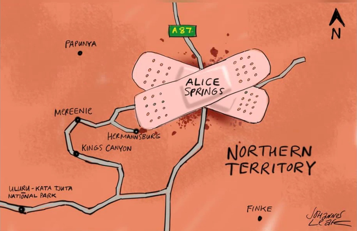 On a map of the Northern Territory are two large criss-crossed band-aids labelled 'Alice Springs.' 