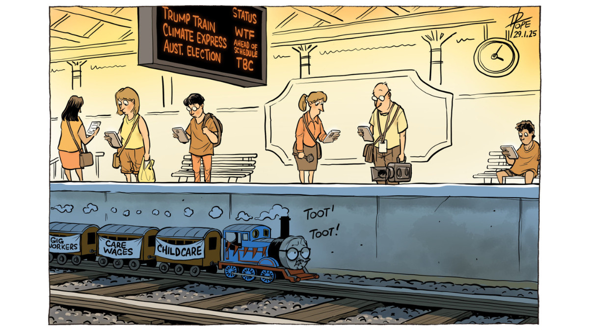 Commuters wait for a small train with PM Anthony Albanese's face. The carriages, 'Gig workers,' 'care wages,' and 'childcare,' are out of sight below the platform. Everyone is looking at their phones. 