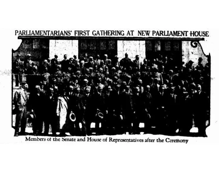 A newspaper clipping with a photo of a large gathering of men with the heading 'Parliamentarians first gathering at new Parliament House'.