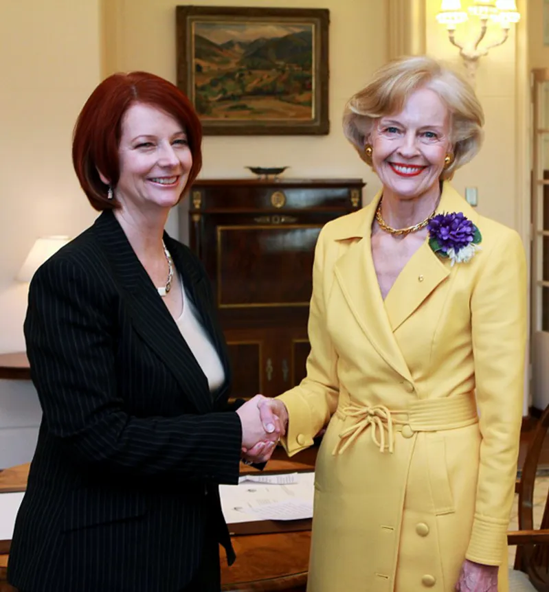 Julia Gilliard shaking hands with Dame Quentin Bryce