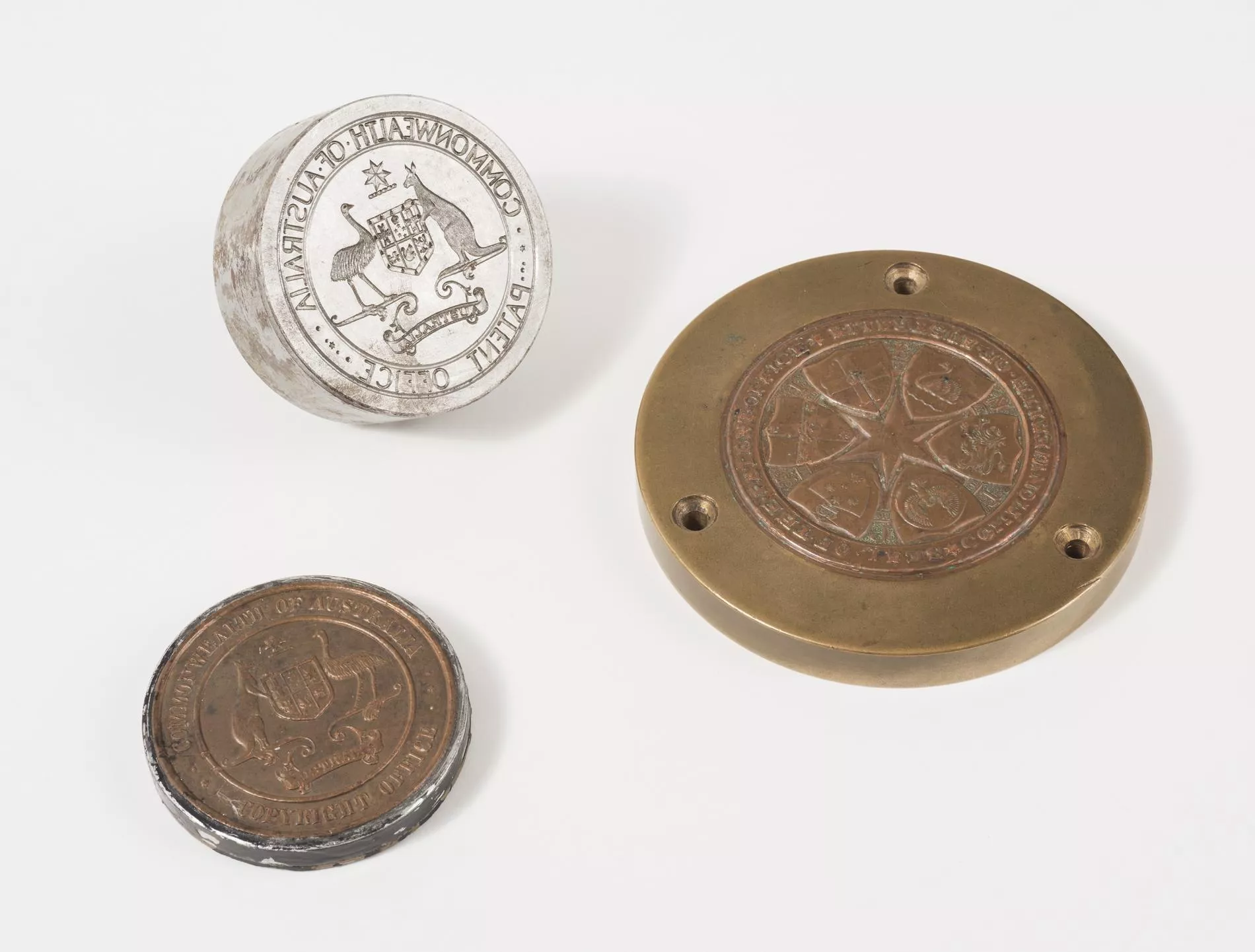 3 metal seals with Australian coat of arms. 