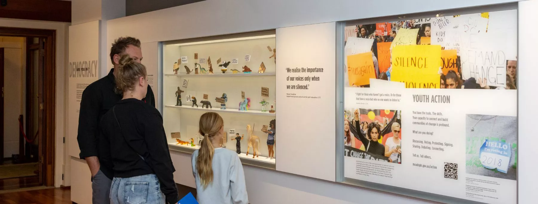 Visitors viewing a section of the exhibition