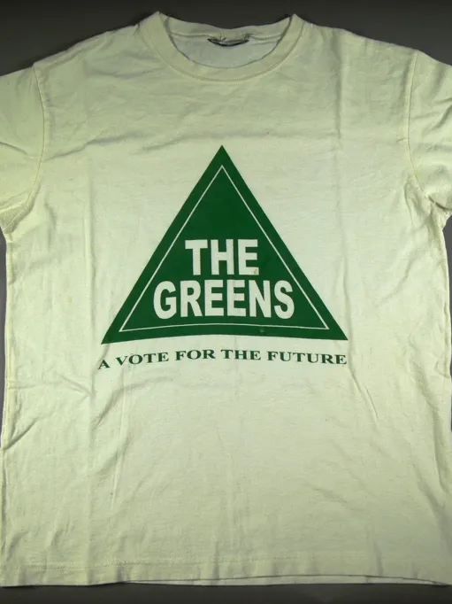 A white t-shirt with a triangle Greens logo and the words 'a vote for the future'.