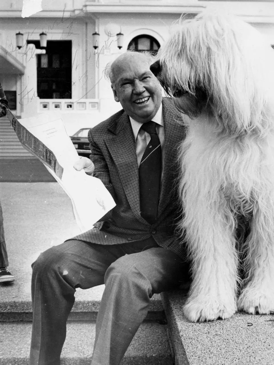 Sir John the sheep dog with his owner