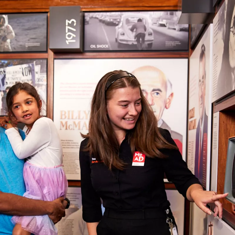 A MoAD staff member and some visitors