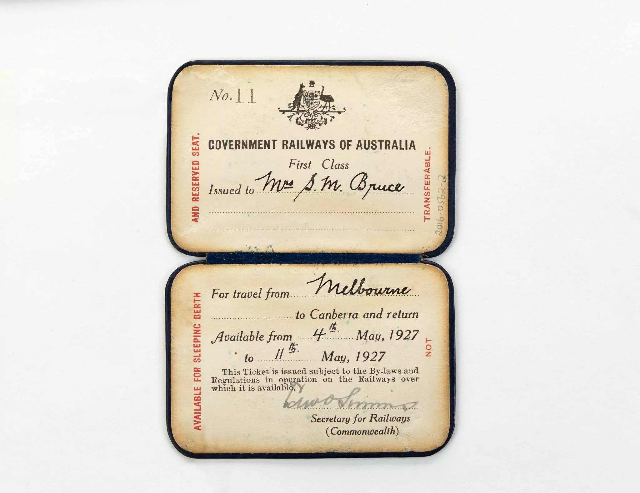 An old paper rail pass with the words Government Railways of Australia, First Class, Issued to Mrs S.M. Bruce for travel from Melbourne to Canberra and return Available 4th May,1927 to 11th May, 1927.