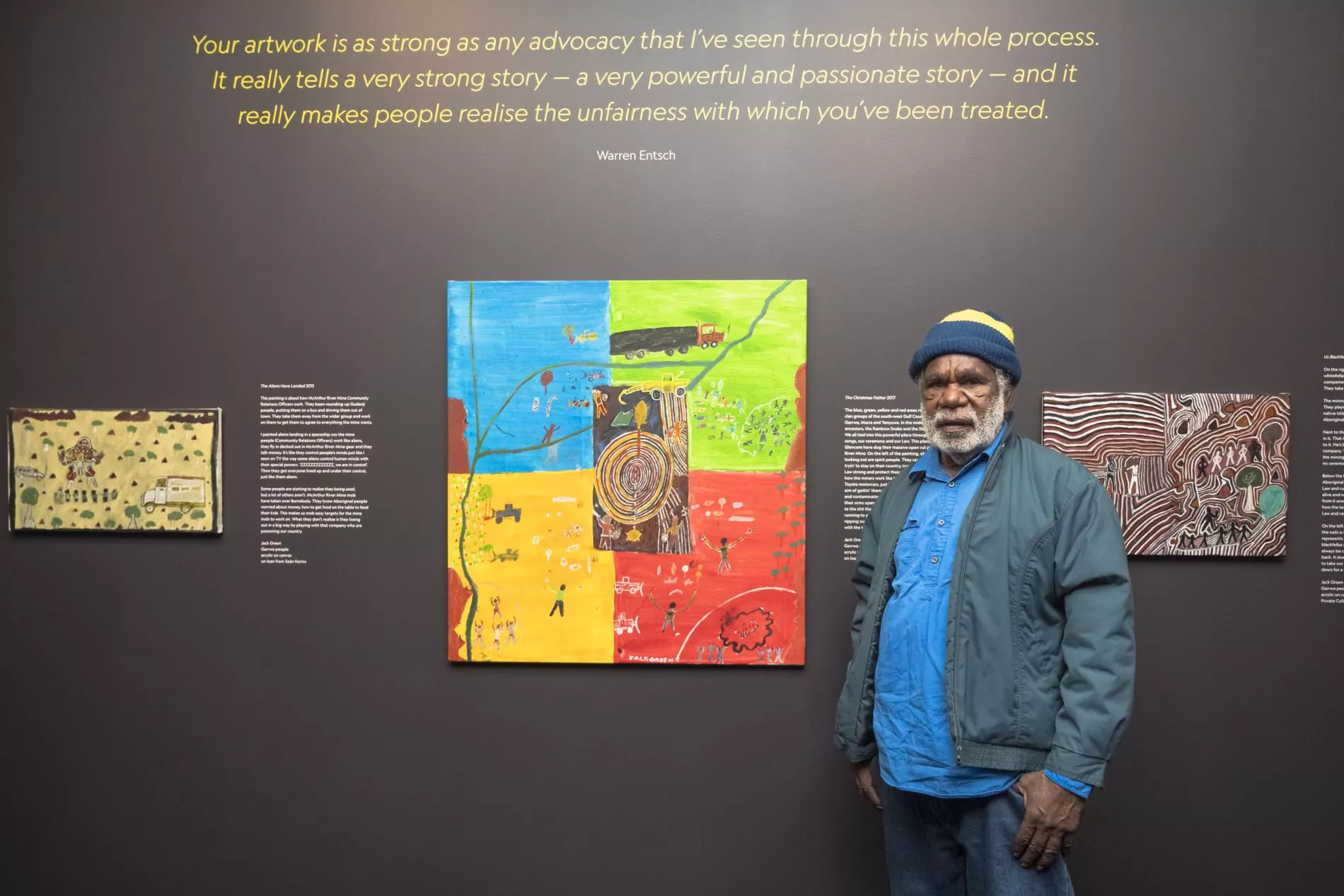 Jack Green stands in front of 3 of his paintings hung at MoAD. Jack Green stands in front of 3 of his paintings hung at MoAD.